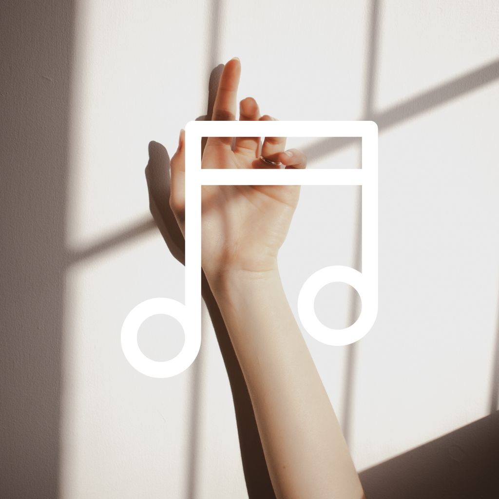 Hand in the air with a music shape over the top